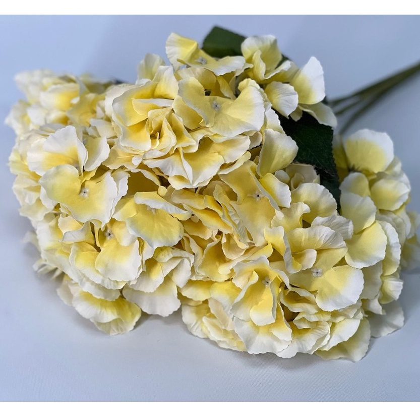 Flowers Hydrangeas (artificial) arranged in a ceramic pot. AAA435