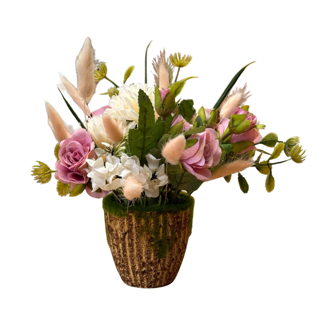 Artificial flower arrangement in a 19cm Alton Flowers display, perfect for home or office decoration.