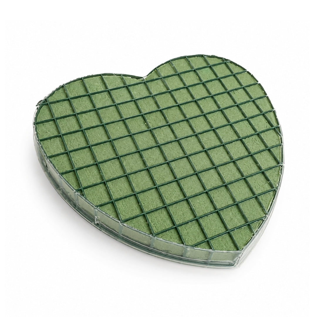 A 30cm heart-shaped green wet floral foam block encased in a clear plastic bottom tray with a protective green plastic grid on top.