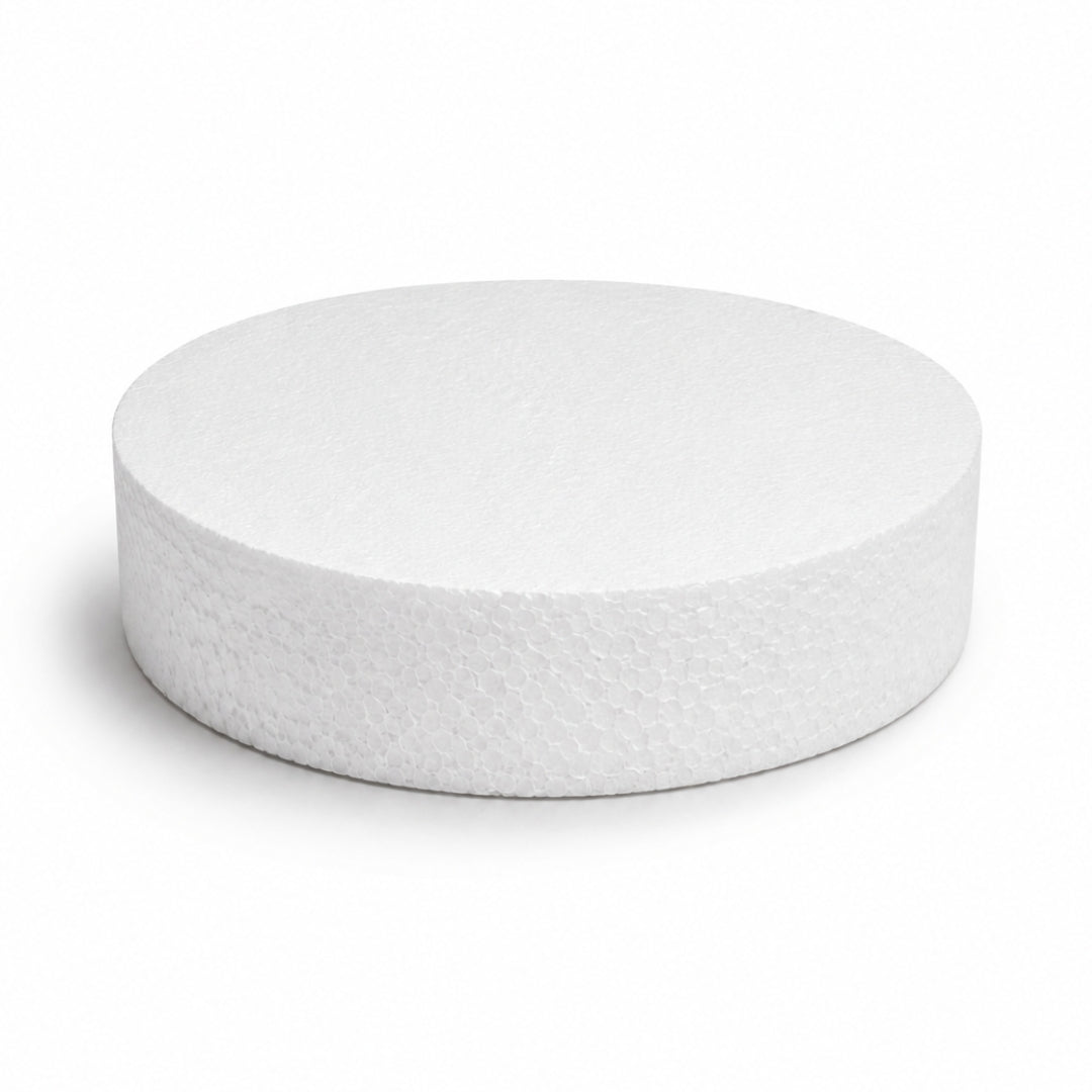 An 8 inch round by 2 inch thick solid white circular styrofoam polyfoam disc on a clean background.
