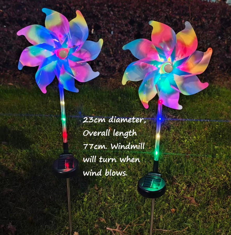 Colorful Alton Flowers windmill pinwheel garden spinner with vibrant blades, perfect for outdoor garden decoration and gardening accessories.