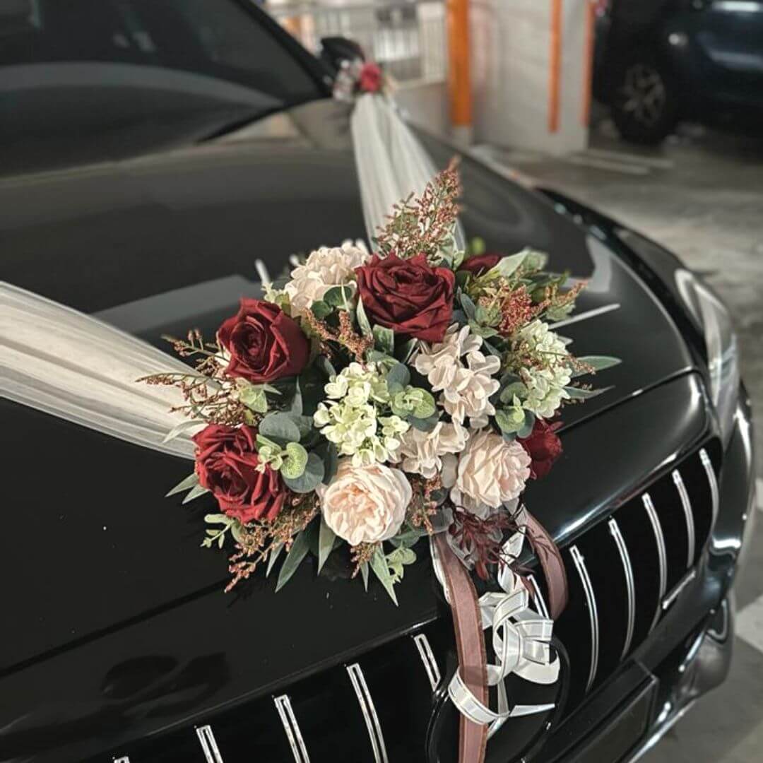 Alton Flowers Splendour wedding car flowers modern bonnet bouquet without netting, arranged with white and green floral accents.