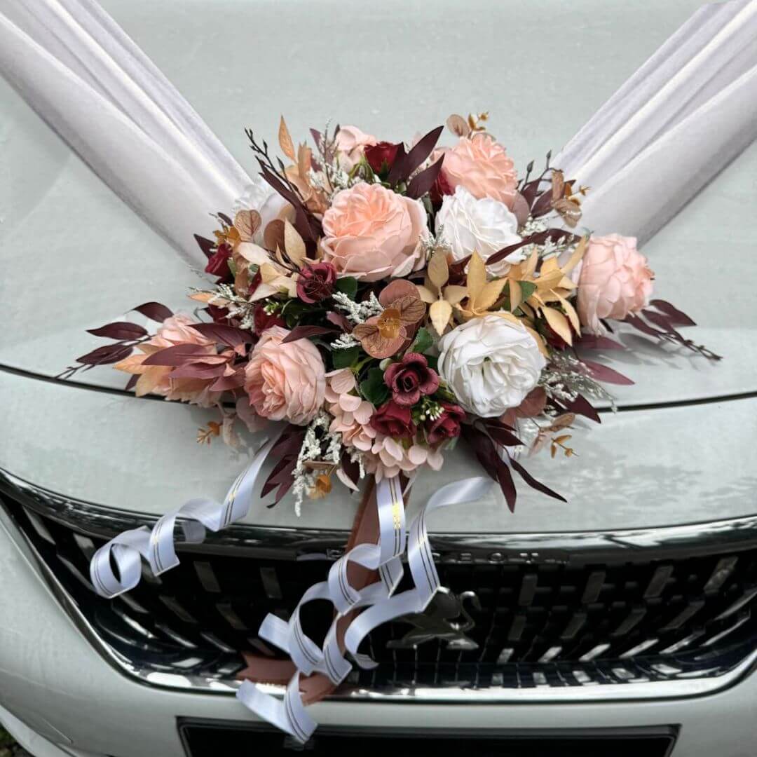 Alton Flowers Splendour Wedding Car Flowers modern bonnet bouquet with vibrant blooms and greenery, without netting, on a car bonnet.