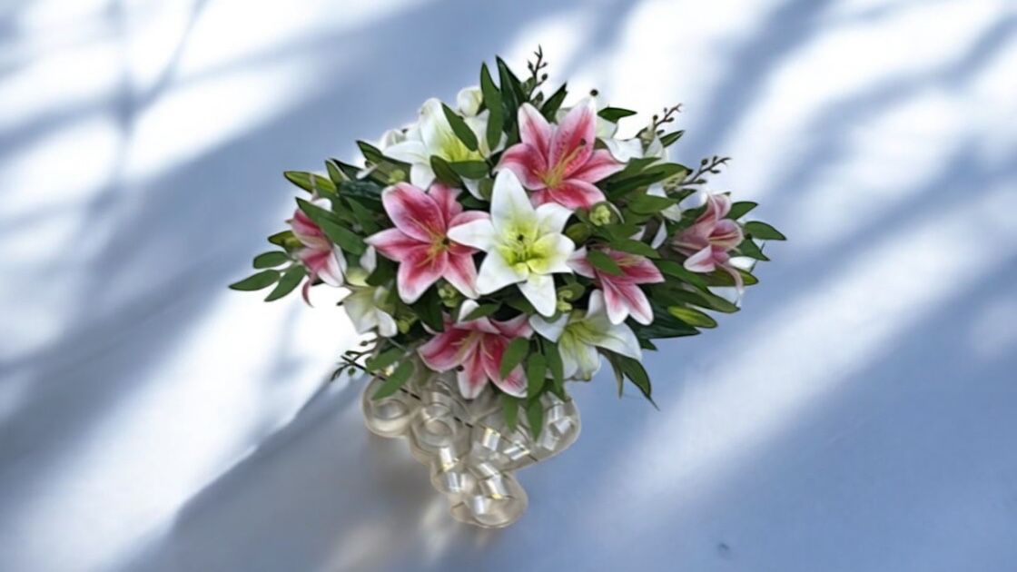 Alton Flowers Splendour wedding car bonnet bouquet with elegant floral arrangements on a car hood, without netting for a modern look.