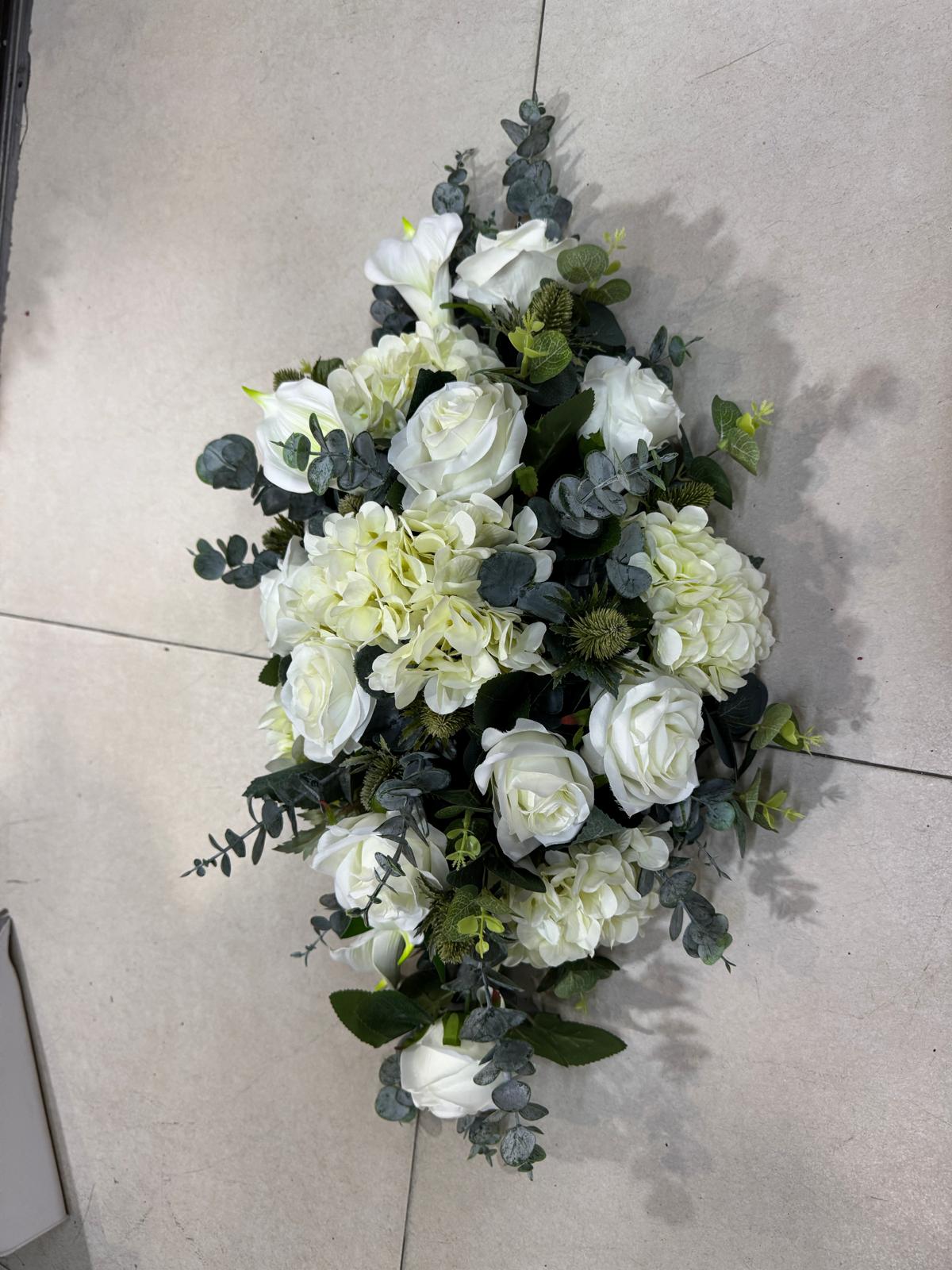 Luxury wedding car flowers arrangement by Alton Flowers featuring elegant floral decor for special occasions.