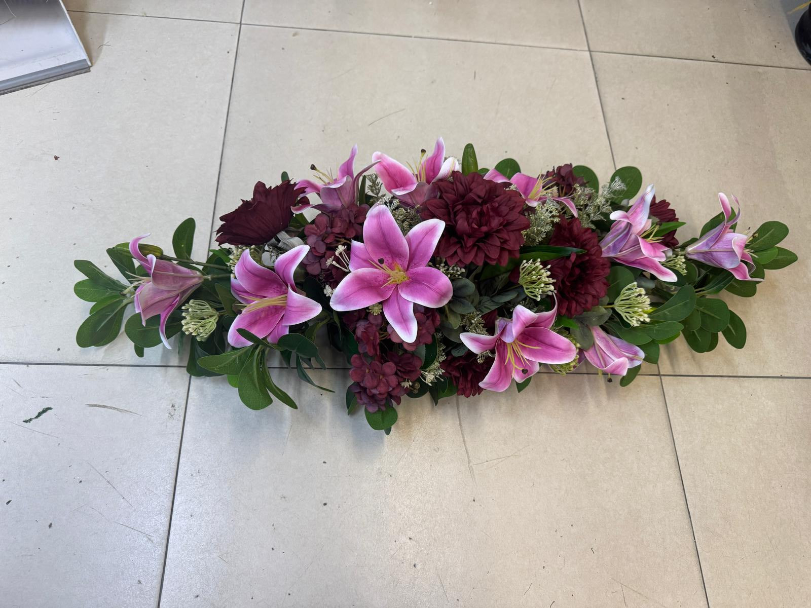 Luxury wedding car flowers arrangement by Alton Flowers featuring vibrant floral designs for special wedding occasions.