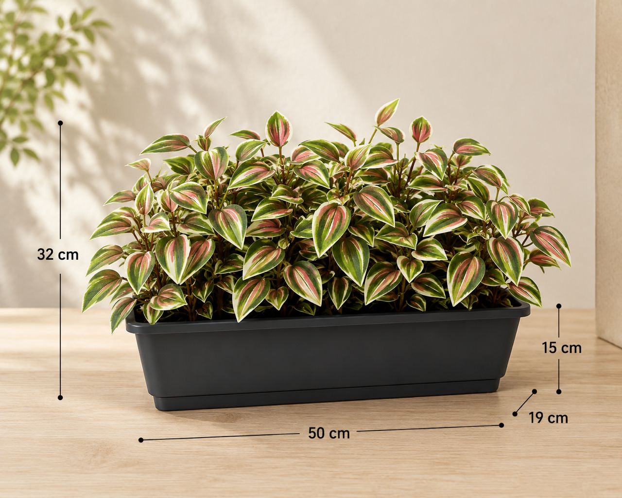 Mini eucalyptus artificial plant in a plastic rectangle planter, 35cm tall, from Alton Flowers, lush green foliage for home decor.