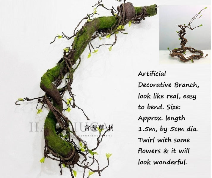 Artificial decorative branch, 1.5m long with 5cm diameter, featuring small green leaves and moss accents.