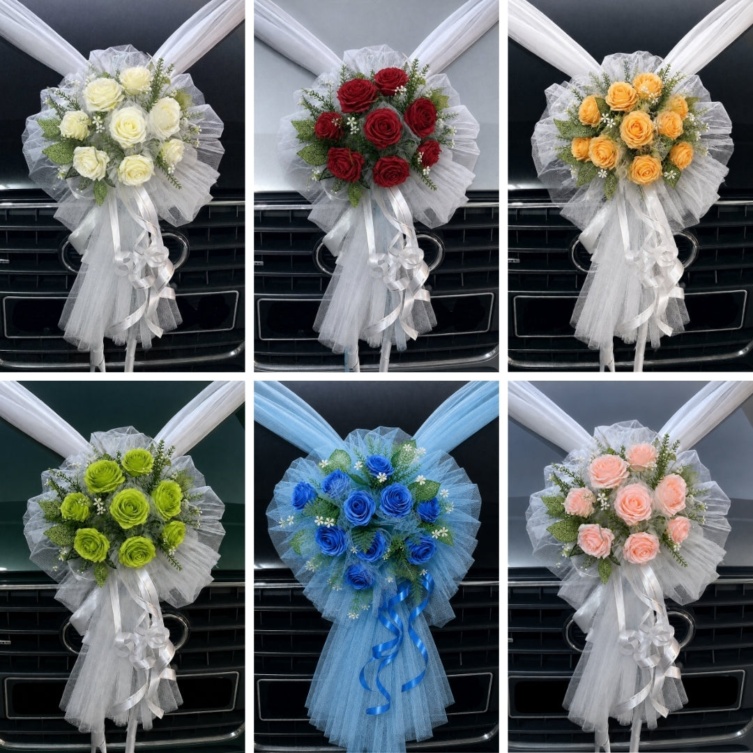 Artificial floral wedding car arrangement with netting by Alton Flowers, featuring classic white and pastel flowers on a vintage vehicle.