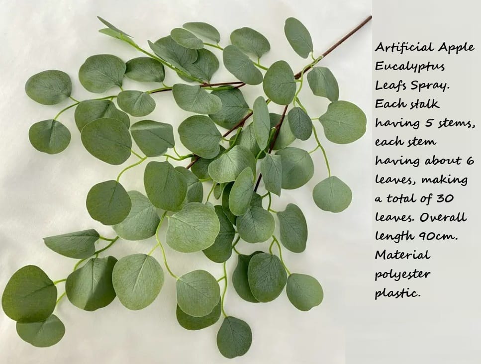Artificial eucalyptus leaves spray with text on a light background