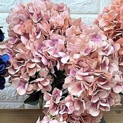 Flowers Hydrangeas (artificial) arranged in a ceramic pot. AAA435