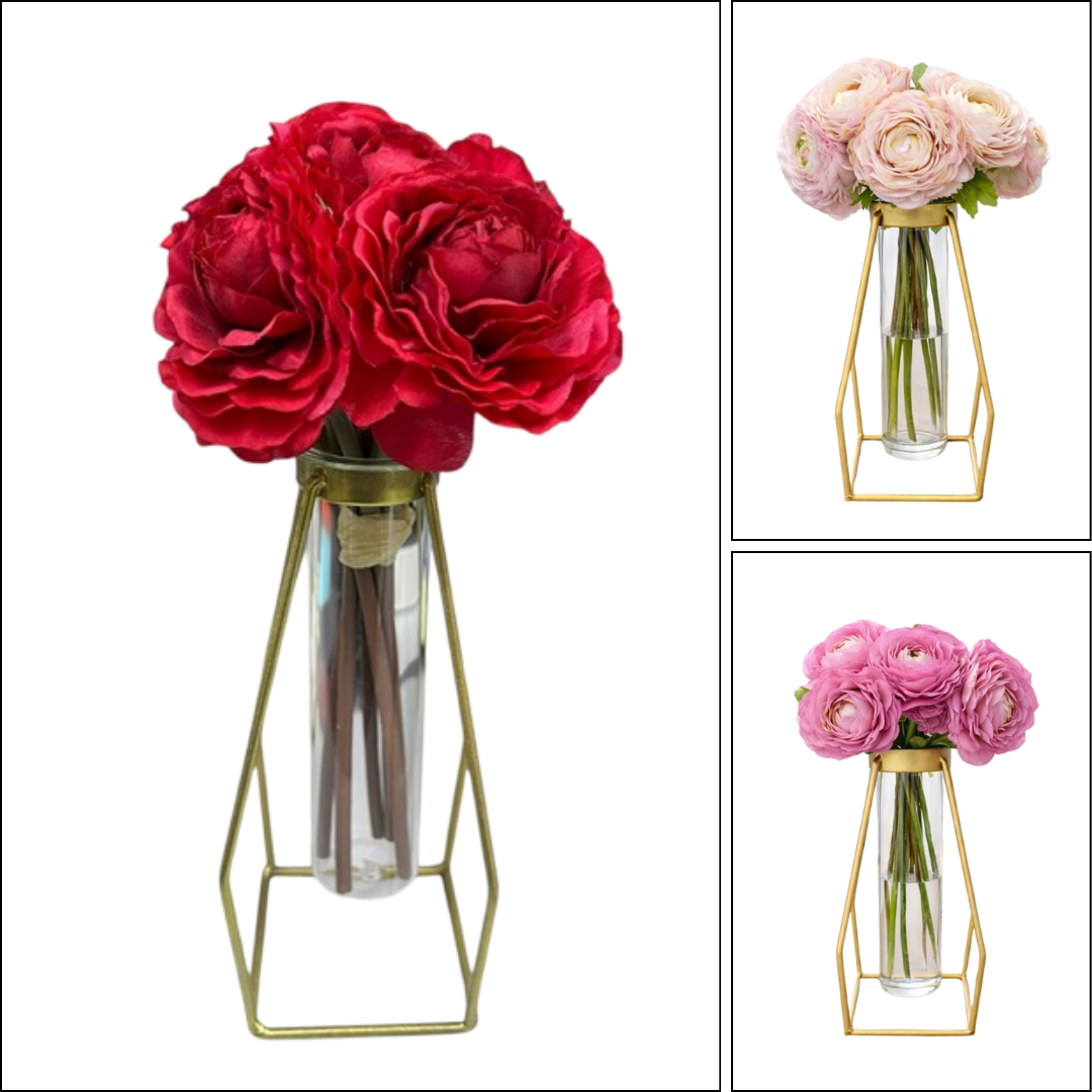 Artificial 25cm peony flower bush in a clear glass vase, from Alton Flowers, with vibrant blooms and lush green foliage.
