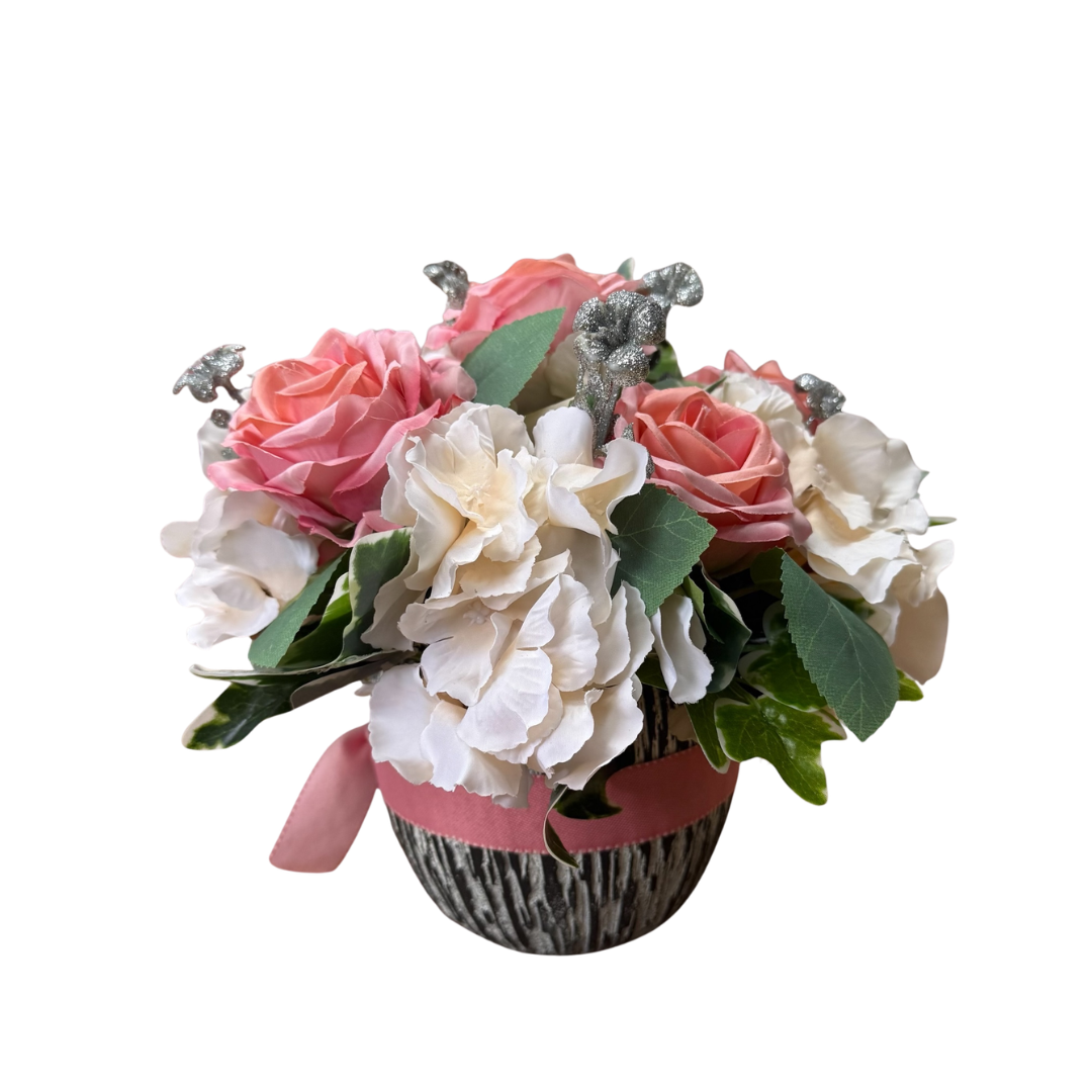 Artificial flower arrangement by Alton Flowers, 25cm tall with vibrant blooms for home or office decor.