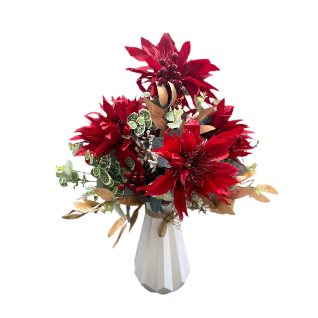 Bouquet of red flowers in a white vase on a white background