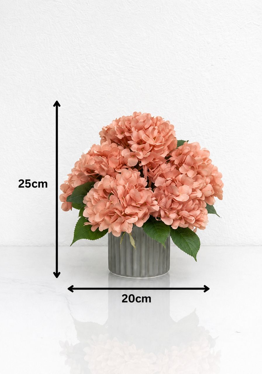 Artificial hydrangea flower arrangement in a 25cm elegant display by Alton Flowers, showcasing vibrant, realistic blossoms in a natural setting.
