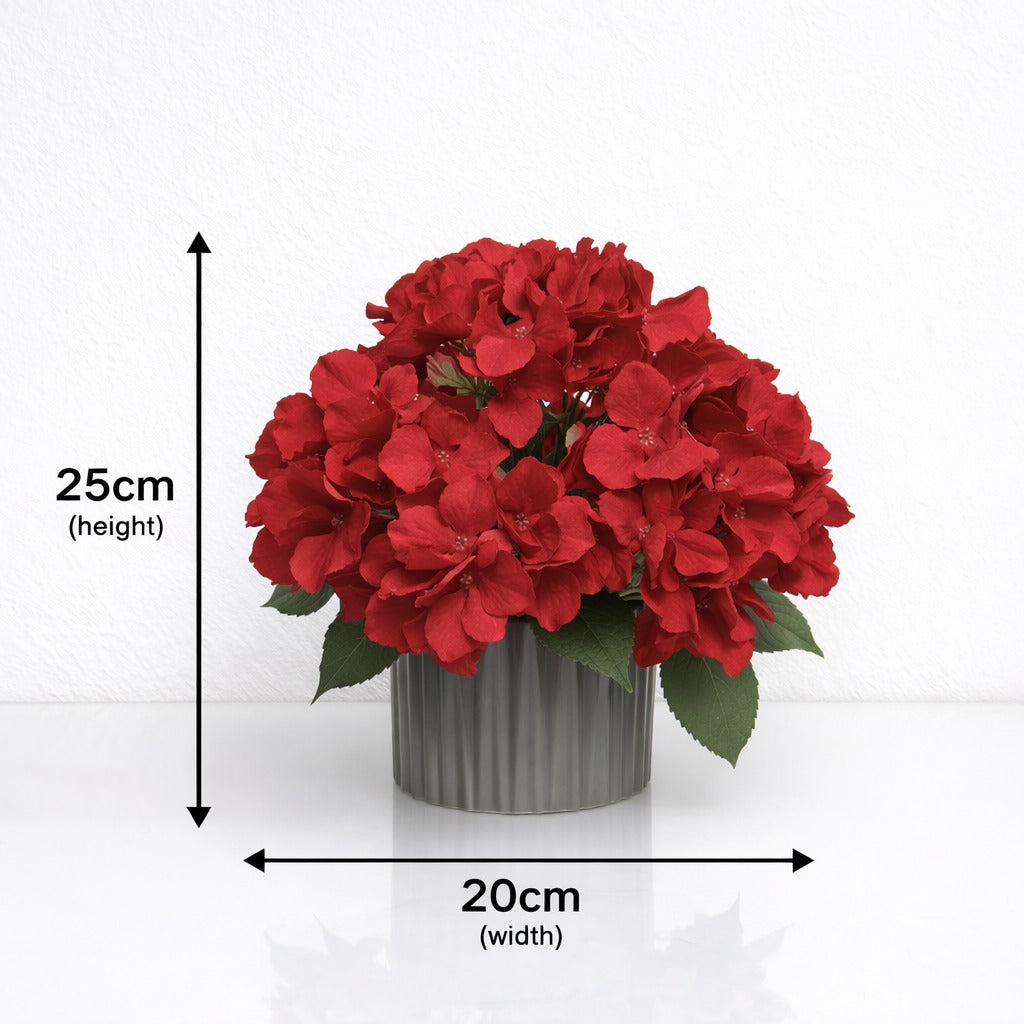 Artificial hydrangea flower arrangement in a 25cm size, featuring realistic blooms by Alton Flowers.