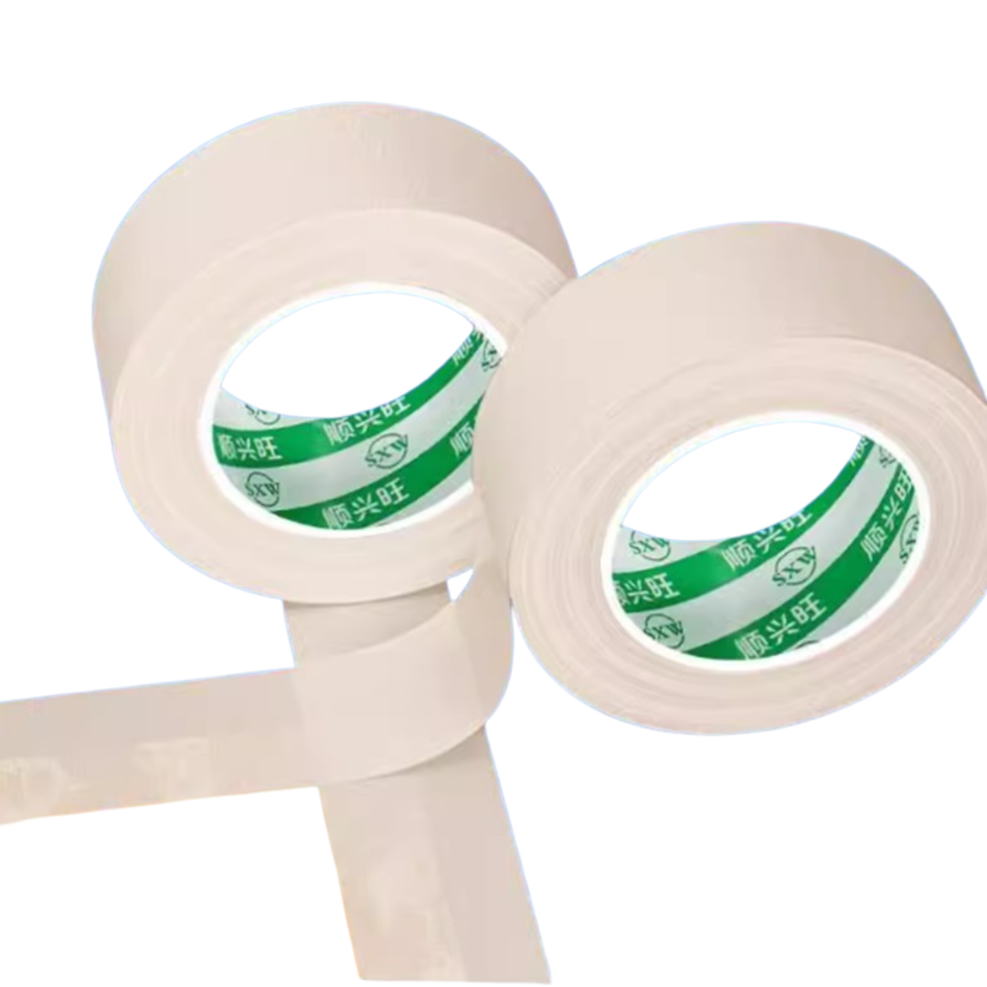 Two rolls of medical tape with a clear label on a white background