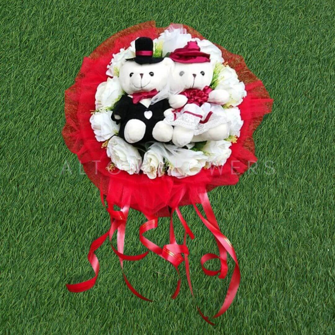Alton Flowers plush wedding car flowers featuring a bridal plushie with floral decorations for wedding car decor.