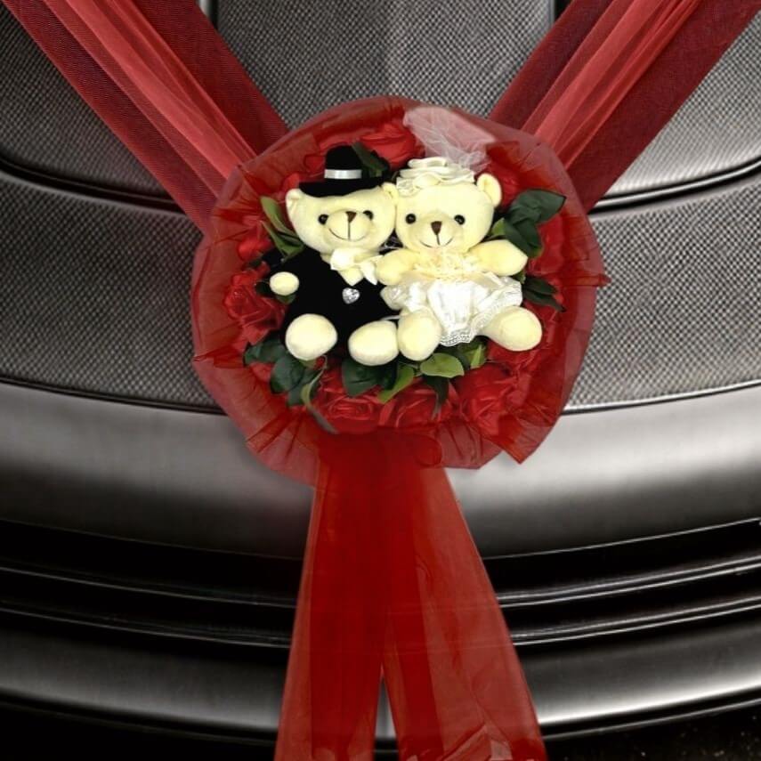 Alton Flowers plush wedding car decoration with bridal plushie and floral accents on a white background.