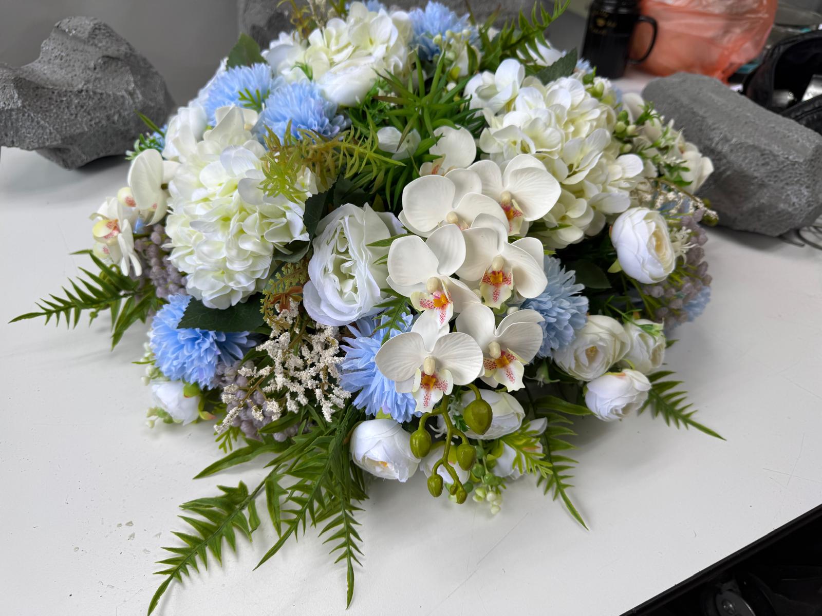 Luxury wedding car flowers arrangement by Alton Flowers featuring elegant floral decor for special occasions.