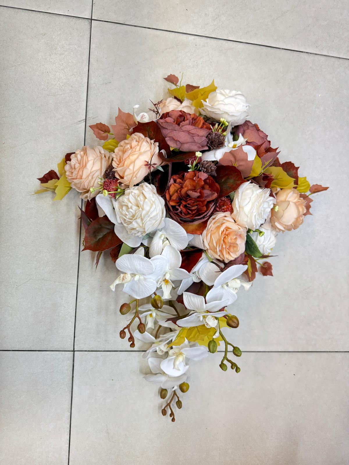 Luxury premium wedding car flowers by Alton Flowers, elegant floral arrangements decorating a classic vehicle.