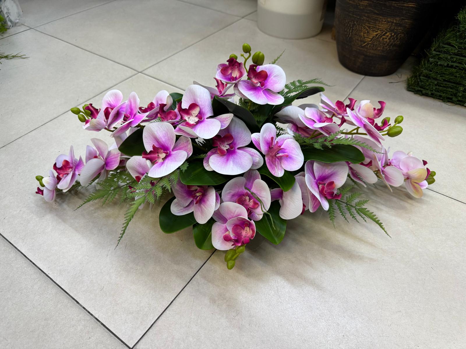 Luxury wedding car floral arrangement by Alton Flowers featuring elegant, premium floral decorations for a special vehicle.