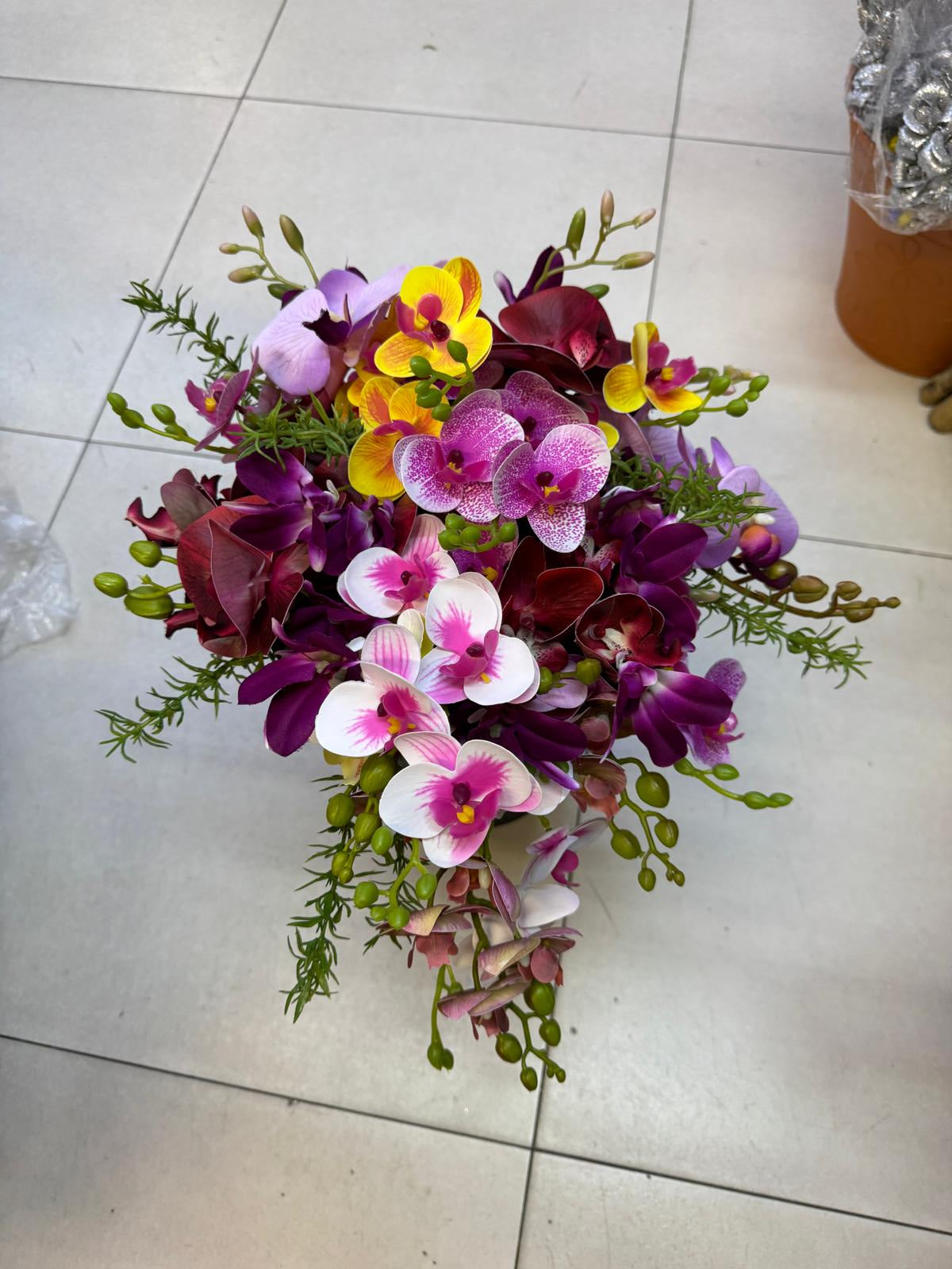 Luxury wedding car flowers arrangement by Alton Flowers, featuring elegant floral decorations for a stylish wedding vehicle.