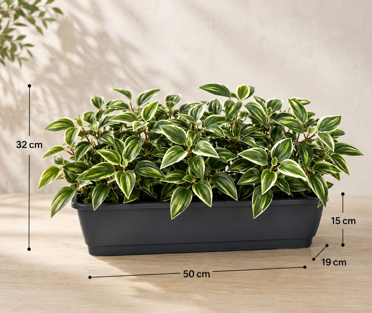 Mini eucalyptus artificial plant in a plastic rectangular planter, 35cm tall, from Alton Flowers, realistic faux foliage for decor.