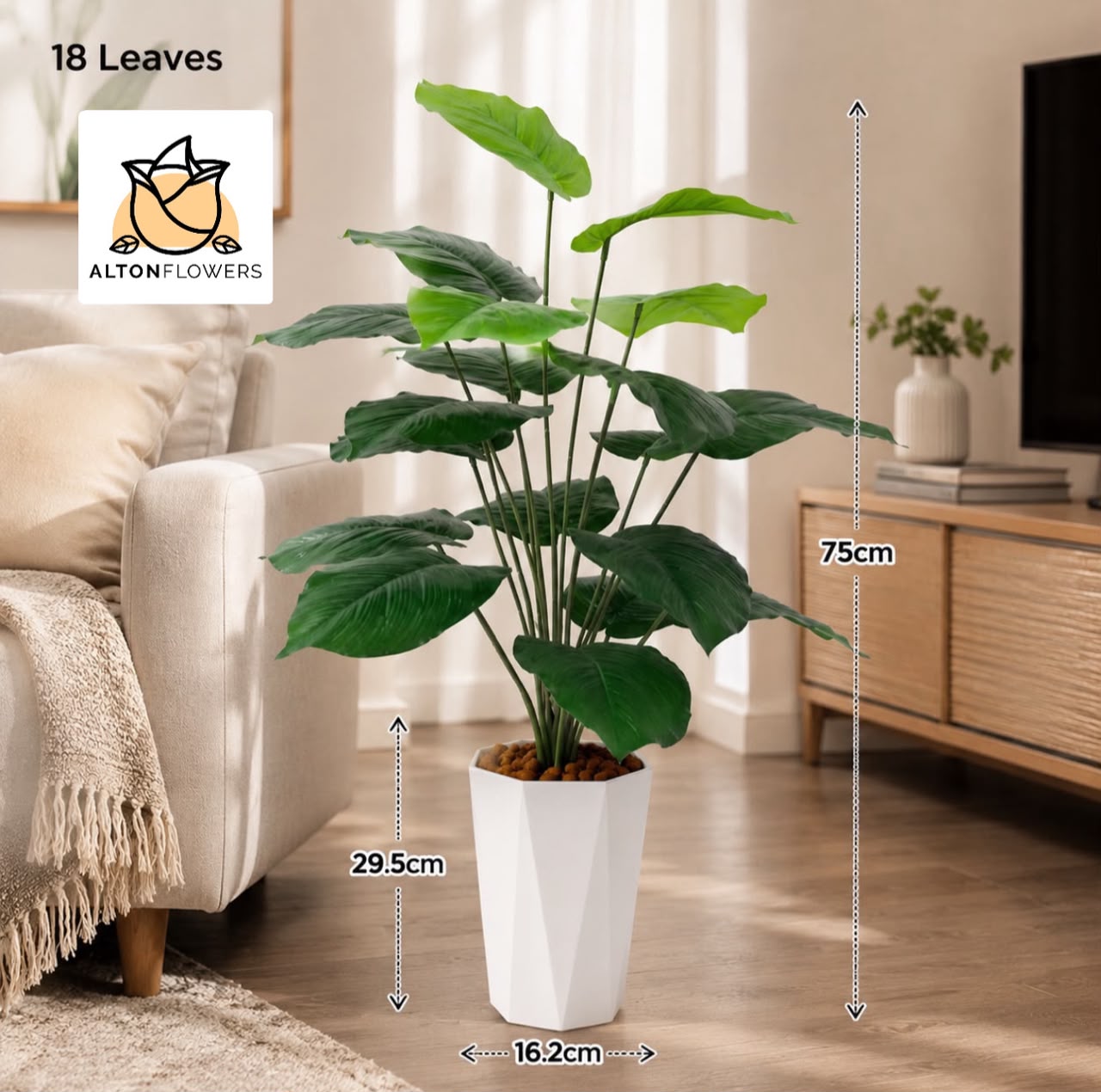 Artificial plant with 18 lush leaves, 75cm tall, from Alton Flowers, showcasing realistic greenery in a natural arrangement.