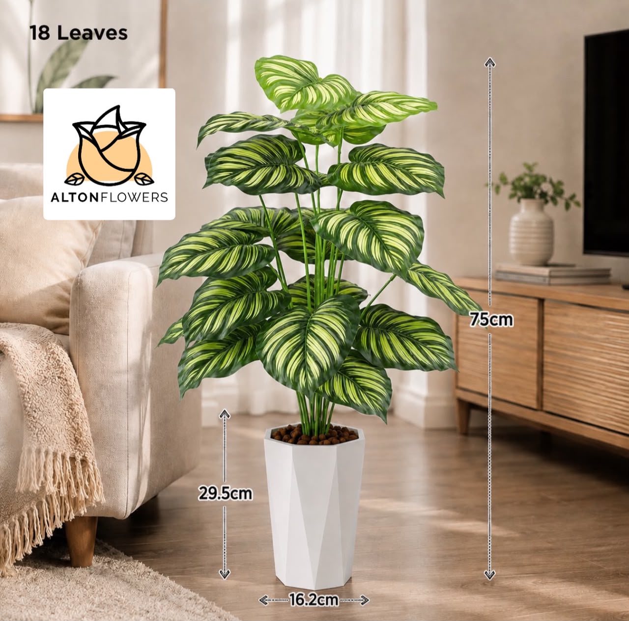 Artificial plant with 18 lush leaves, 75cm tall, from Alton Flowers, showcasing realistic greenery in a natural setting.