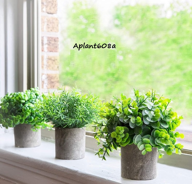 Set of three 22cm artificial potted plants with flocked leaves by Alton Flowers, showcasing realistic small decorative greenery.