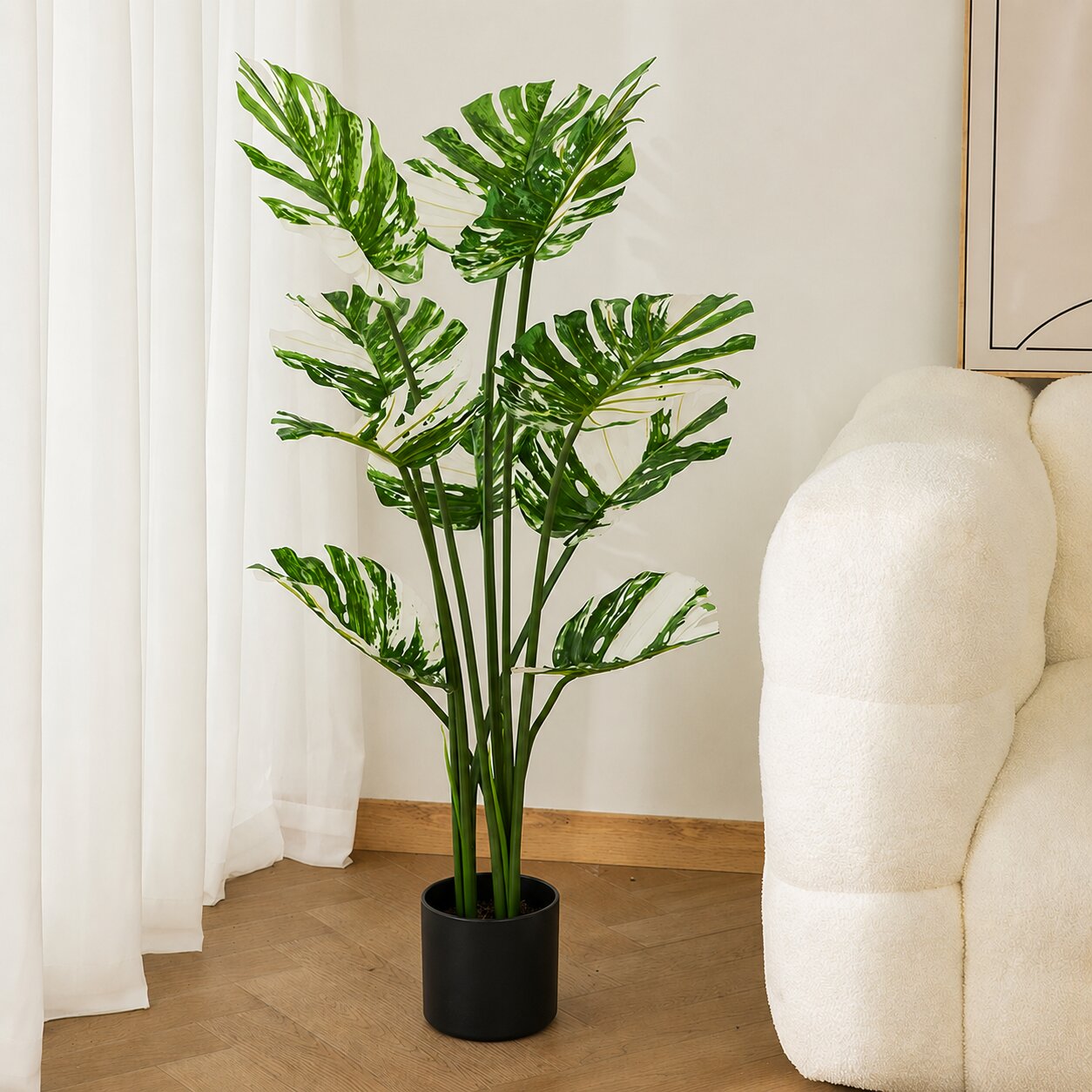 Artificial 120cm Albo Monstera plant by Alton Flowers, ideal for home decor, garden, and event decoration with lush green leaves.