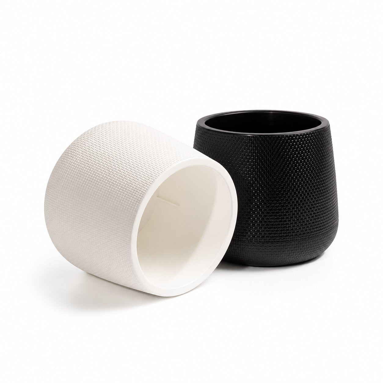 Round black plastic planter pot with an embossed diamond knurling cross-hatch texture showing 17cm and 20.5cm measurements