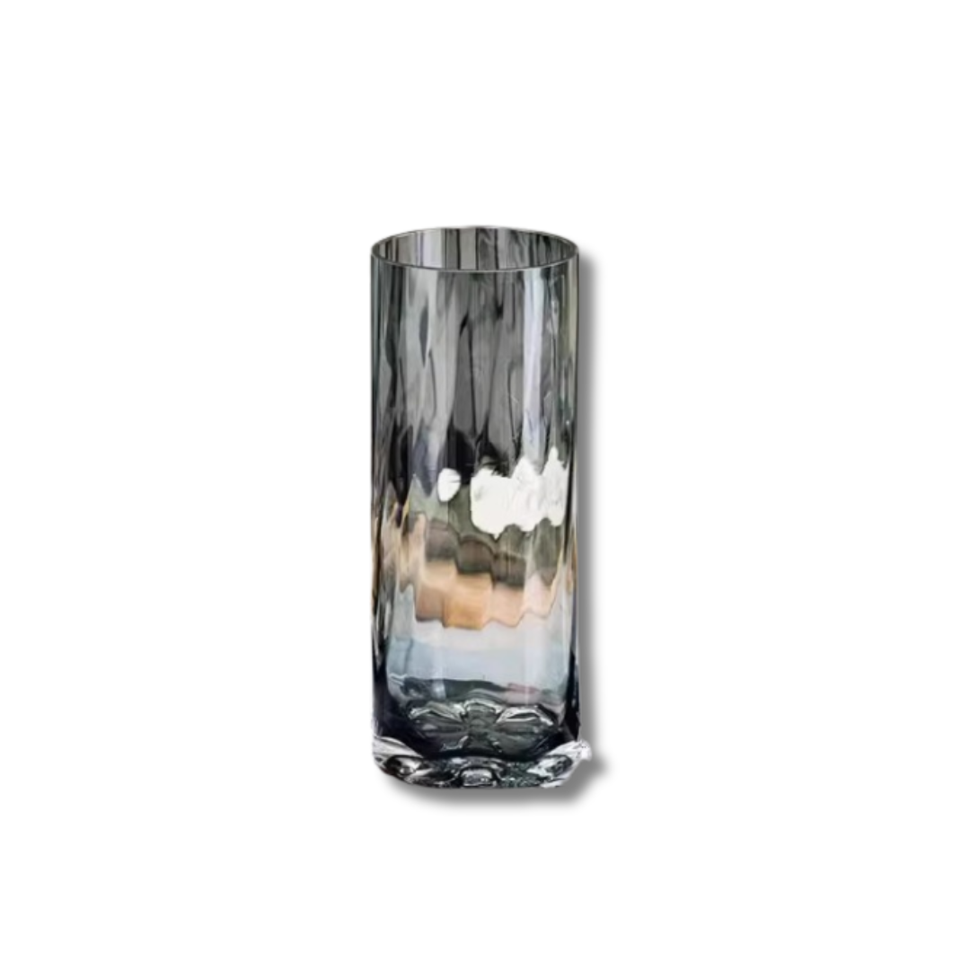 Tall smoky grey textured cylindrical glass vase measuring 10cm by 25cm, suitable for modern home decor or floral arrangements.