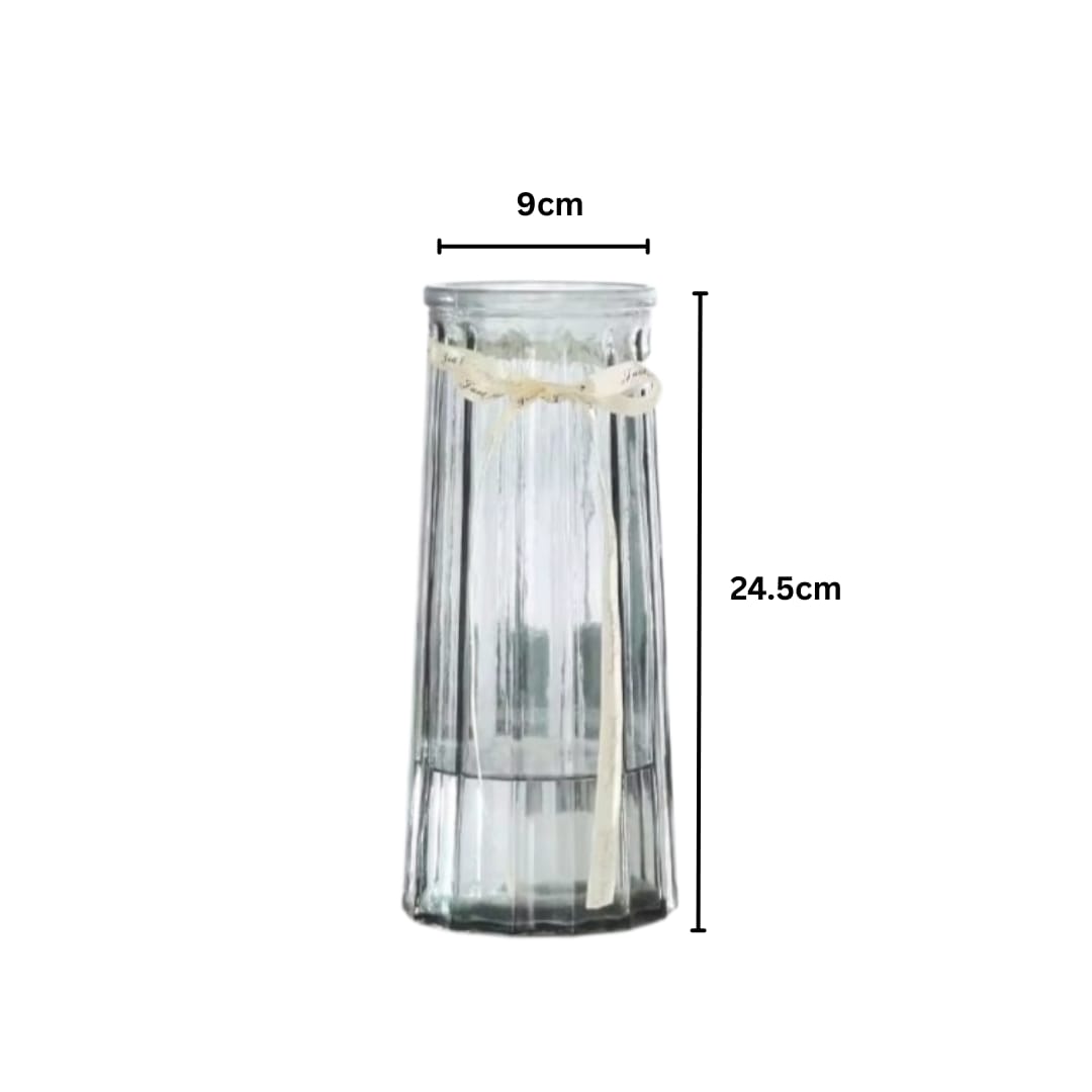 Clear glass vase with measurements on a white background