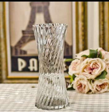 Alton Flowers 25cm clear glass vase for flower arrangements, plants, and events, with a sleek, cylindrical design.
